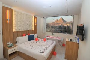 Μια τηλεόραση ή/και κέντρο ψυχαγωγίας στο Sóul In Pyramids View