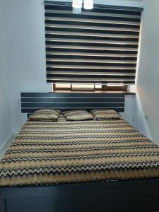 Ένα ή περισσότερα κρεβάτια σε δωμάτιο στο ЦО Радуга