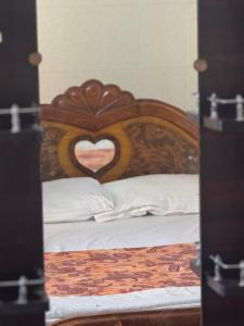 Ένα ή περισσότερα κρεβάτια σε δωμάτιο στο SRI DEVI Residency +1 φωτογραφίες