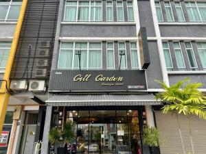 a store front of a building on a city street at Collection O Malacca Near St John's Fort Formerly Gill Garden in Melaka