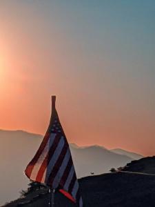 a vase with an american flag sitting on top of a mountain at Beautiful Dome for a Romantic Glamping Escape with Breathtaking Views in Montana in Plains