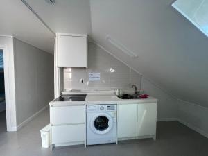 Kuchyň nebo kuchyňský kout v ubytování 뚠하우스3