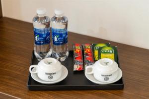 Příslušenství pro přípravu čaje a kávy v ubytování Grand Hanoi Boutique Hotel