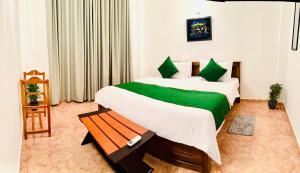 Ένα ή περισσότερα κρεβάτια σε δωμάτιο στο Kandy Villa 119