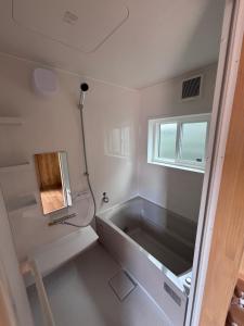 Ένα μπάνιο στο ペンションハートウォーマー