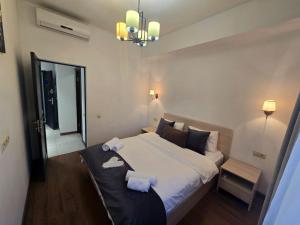 Ένα ή περισσότερα κρεβάτια σε δωμάτιο στο Ararat View Apartments