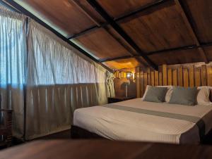 Una cama o camas en una habitación de The Wild Yala