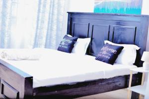 Giường trong phòng chung tại Eldo oasis