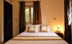 Postel nebo postele na pokoji v ubytování Mafalda - Luxury Apartments & Suites