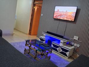 TV a/nebo společenská místnost v ubytování LnC bnb + 3 fotografie