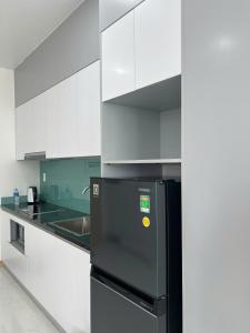 Kuchyň nebo kuchyňský kout v ubytování Góc Nắng HomeStay and Apartment