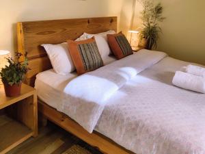 Postel nebo postele na pokoji v ubytování Tanani Newa Home