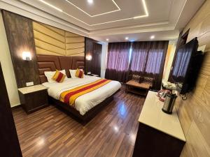 Postel nebo postele na pokoji v ubytování Victory Hotel and Restaurant by GS Hospitality