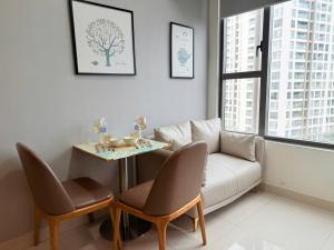 Posezení v ubytování CBD Luxury Apartment In Rivergate Building