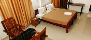 Postel nebo postele na pokoji v ubytování Oxxon Airport Hotel