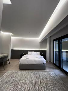 Ένα ή περισσότερα κρεβάτια σε δωμάτιο στο Grand Museum Pyramids