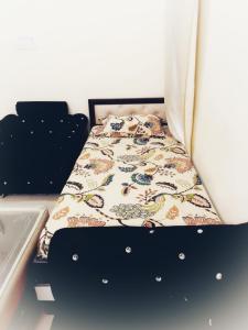 Postel nebo postele na pokoji v ubytování Tulsi Abode