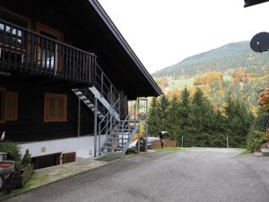 a staircase on the side of a building at Chalet in Schruns near Montafon Ski Lift in Schruns +18 photos