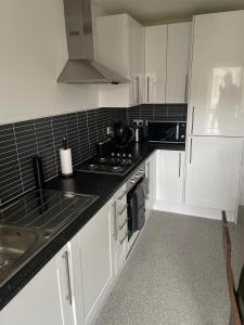 Kuchyň nebo kuchyňský kout v ubytování Maison 109 Suite