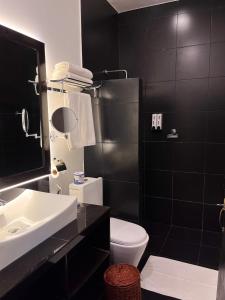 Koupelna v ubytování Sundaras Infinity Jungle Resort & Spa + 20 fotografií