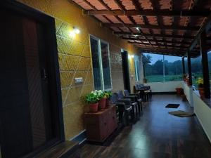 Χώρος καθιστικού στο Kadugadde Homestay +3 φωτογραφίες