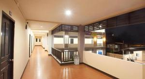 a hallway of a house with a staircase in it at MT Place in Sakon Nakhon