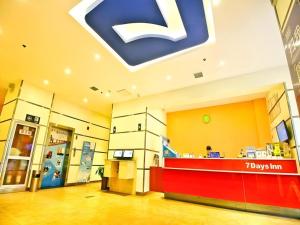 a grocery store with a torymm sign on the ceiling at 7 Days Inn Xi'an Railway Station in Xi'an