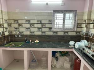 Kuchyň nebo kuchyňský kout v ubytování CC Elite Homestay + 36 fotografií