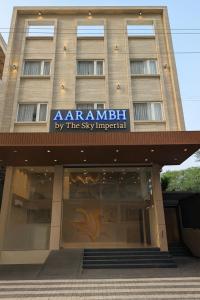 a building with a sign on the front of it at Aarambh By The Sky Imperial Indore in Indore +19 photos