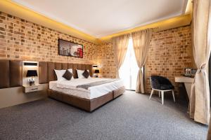 Ένα ή περισσότερα κρεβάτια σε δωμάτιο στο Air Hotel +95 φωτογραφίες