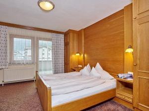 Ένα ή περισσότερα κρεβάτια σε δωμάτιο στο Haus Karin