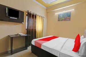 Μια τηλεόραση ή/και κέντρο ψυχαγωγίας στο Collection O Kammasandra Gate Bus Terminal Formerly Riches Inn