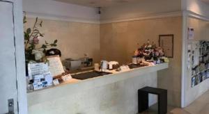 a counter in a store with a counter top at Hotel Gran View Okinawa in Takara
