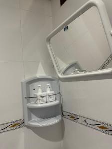 a bathroom with a mirror and a sink at Lanta Salamat House in Ko Lanta +81 photos