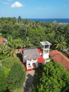 an aerial view of a house with a red roof at Viska Villa 2 Bedroom Home 5 min to Hiriketiya in Nilwella