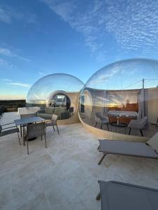 two glass domes on the roof of a building at Panoramic Suites Burbuja junto al Puy du Fou y Toledo in Guadamur