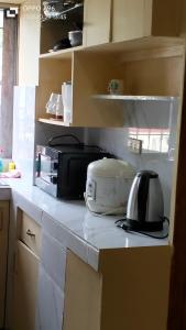 Køkken eller tekøkken på Roswood Baguio Transient Home