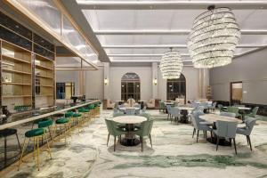 Restoran või mõni muu söögikoht majutusasutuses Lotusa Batulicin by Swiss-Belhotel