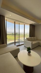 Ένα ή περισσότερα κρεβάτια σε δωμάτιο στο Lamar Residences