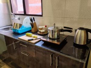 Dapur atau dapur kecil di Tanani Newa Home Family Combo