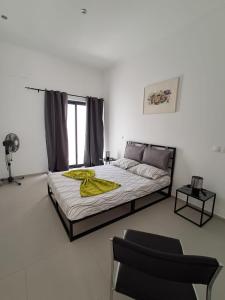 Postel nebo postele na pokoji v ubytování Modern Apartment in Praia