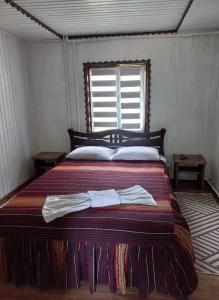 Postel nebo postele na pokoji v ubytování Котедж Лісова тиша