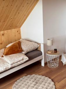 Postel nebo postele na pokoji v ubytování Osada Golców