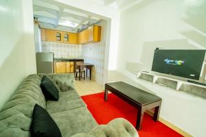 Kuchyň nebo kuchyňský kout v ubytování Sukoon Nyali Suites