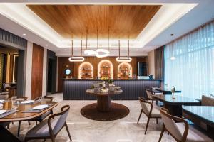 Et opholdsområde på Boutique Hotel Olive + 29 billeder