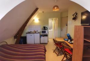 Kuchyň nebo kuchyňský kout v ubytování hotel de la bonnaventure