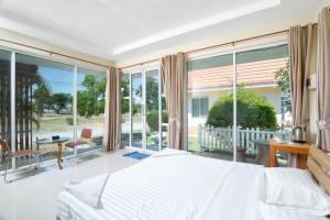 En eller flere senge i et værelse på The Peak Resort Chaiyaphum