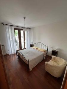 Postel nebo postele na pokoji v ubytování Stella Apartment