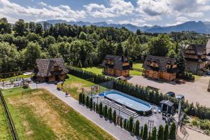 an aerial view of a house with a pool at Willa Józef in Zakopane