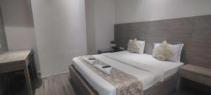 Giường trong phòng chung tại HOTEL O ENERGY SPACE